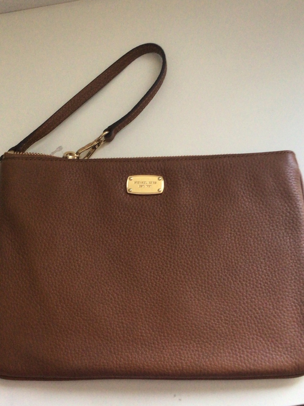 Michael Kors Brown Pebbled Leather Wristlet with Gold Hardware
